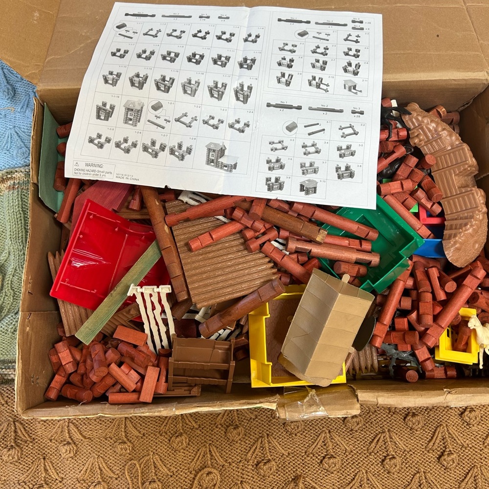 Two Lincoln logs sets